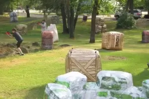 A barriers at a laser tag party in a park.