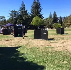 A group of laser tag barriers for a game of laser tag in a park.