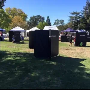 A group of laser tag barriers in a park.
